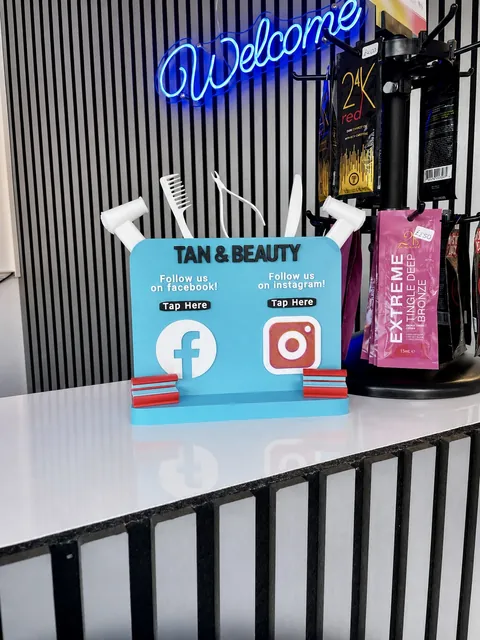 Blue NFC display on a salon reception desk