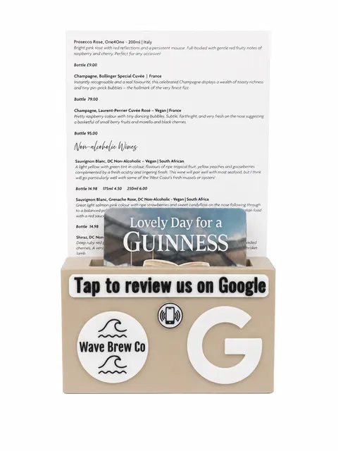 Menu holder with a tap to review panel at Wave Brew Co
